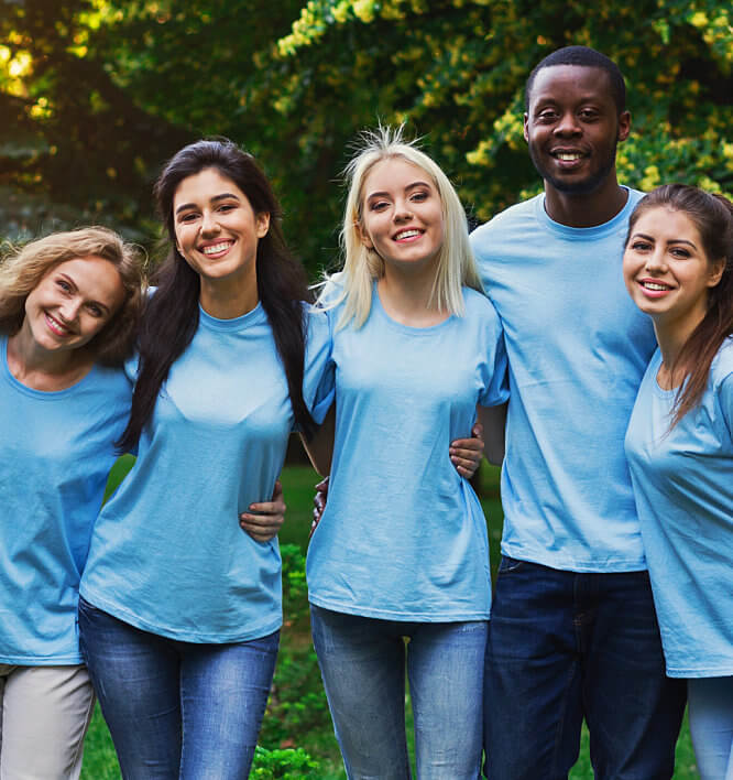 group of volunteer people wearing blue shirt